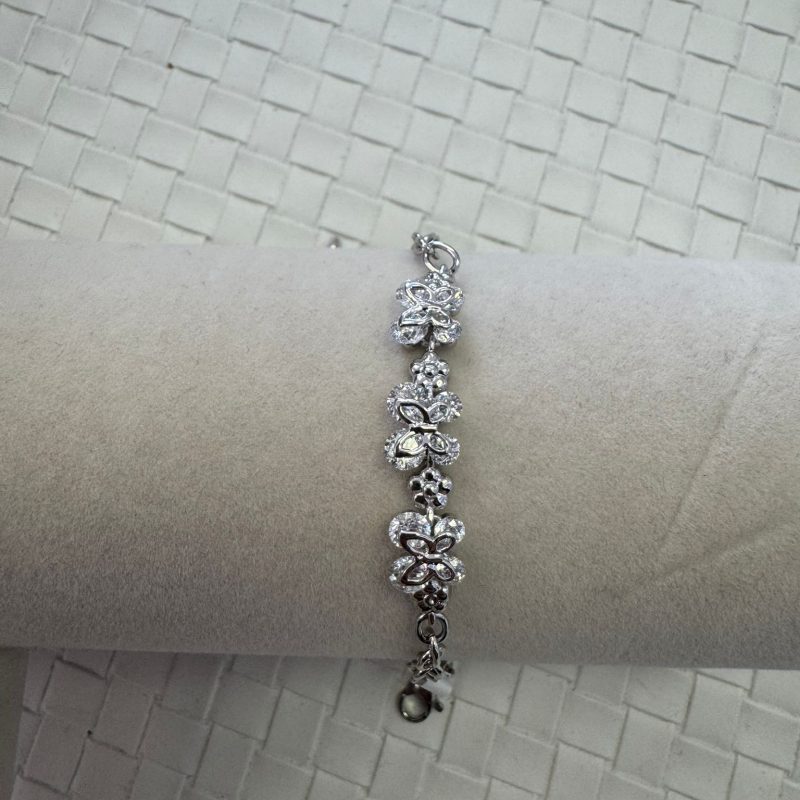 6 to 7cm stainless steel with 5 microns of 14k gold